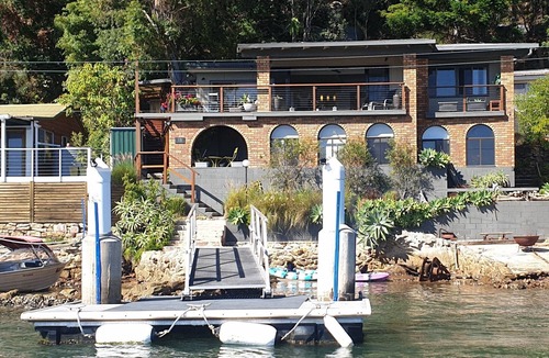 Little Wobby House | Waterfront with private jetty and sunset views. Boat access only. Pet friendly.