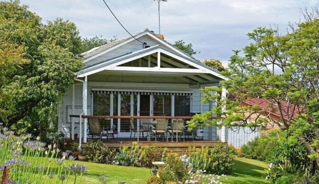 1950s Bayfront Classic With Glistening Water Views