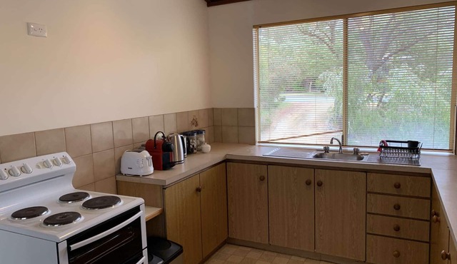 4BR home with estuary views nestled amongst native trees and flowers in Dawesville