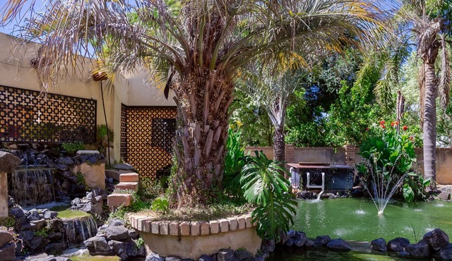 5 Bedroom home with an amazing back yard including a pool and large Koi ponds