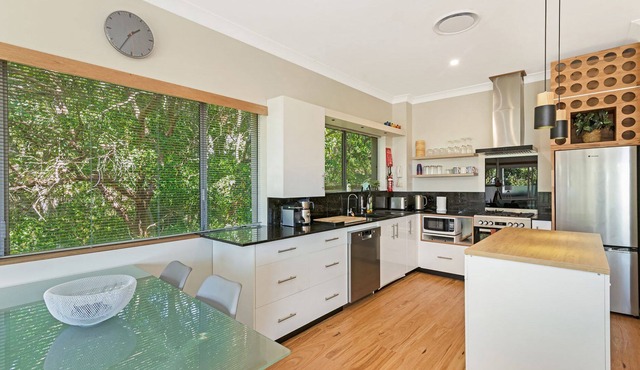 8/24 Panorama Drive - Modern unit set amongst the trees with beach views