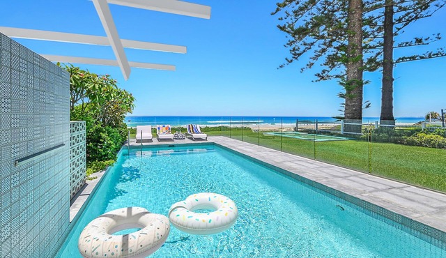 Absolute Beachfront Luxury Home with Heated Pool