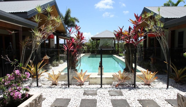 Beachside Bali inspired tropical retreat with large heated Saltwater pool.