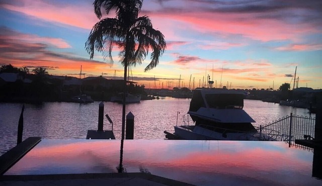 Beautiful spacious waterfront home right on the Cullen Bay Marina!
