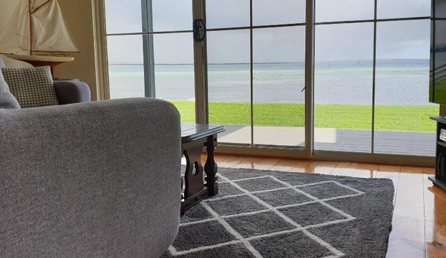 Blue Seas - Beach Front Living