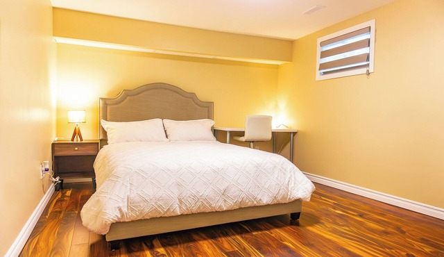 Bright & Spacious 2BR + Parking | Near TTC & Shops in Toronto