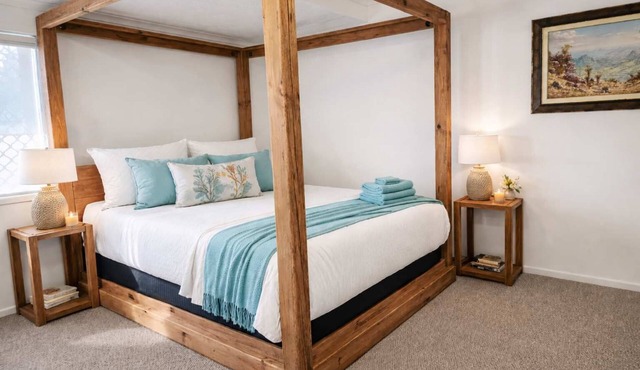 Central 2BR Apartment | Walk to Strand & CBD | Courtyard + Parking