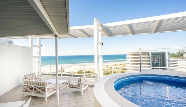 Coastal Luxe Penthouse with rooftop pool