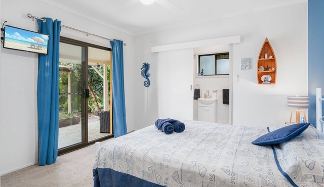 Country accommodation handy to town. Stunning rural views overlooking pool.