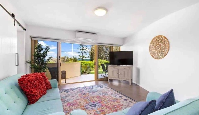 Family-friendly, oceanfront apartment with salt-water pool and private garden!