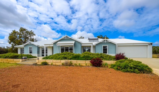 Large luxury home in tranquility on a 100 acre land