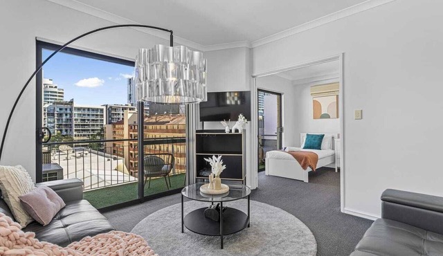 Modern Urban Escape: 2BR with South-Facing Balcony