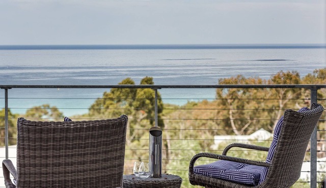 PANORAMIC VISTAS OF THE PRISTINE COASTLINE & TURQUOISE WATERS OF EAGLE BAY.