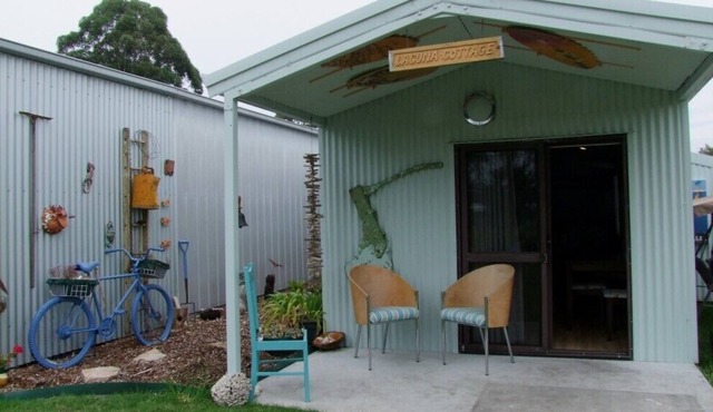 Private cabin in a quiet garden setting with plenty of birdlife