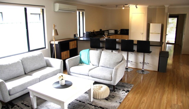 Roomy family home fully equipped for short or long term stays. Free WiFi