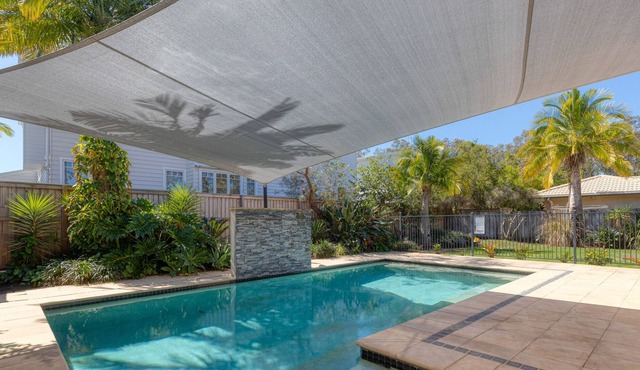 Spacious 4-Bed Home with Pool and Veranda