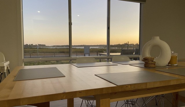 Stunning lake views, entertainer’s deck, fire pit, kids toys & books
