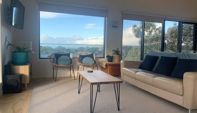 Stunning water views; relaxed coastal atmosphere; multiple entertaining areas