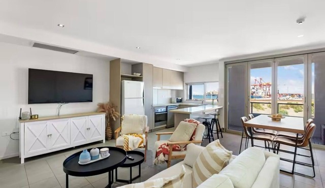 Stylish Coastal Penthouse with Port Views