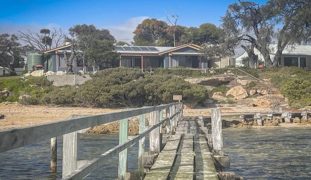Sunset Ridge has direct access to a private beach and small jetty.