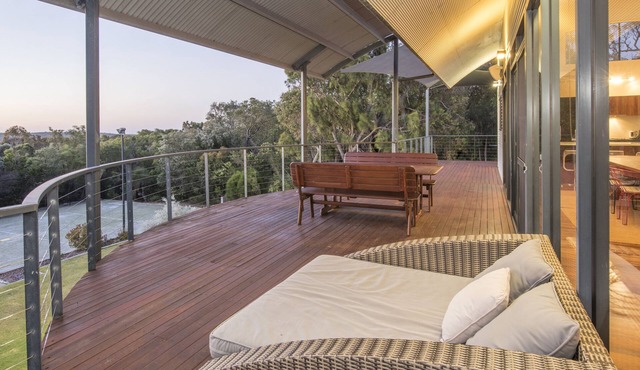 Superb hilltop, secluded location set on eight acres & clear views to the coast.