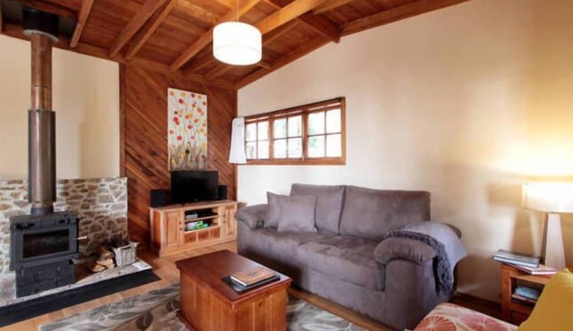 The Cabin-Wake up to the sound of native birdlife.