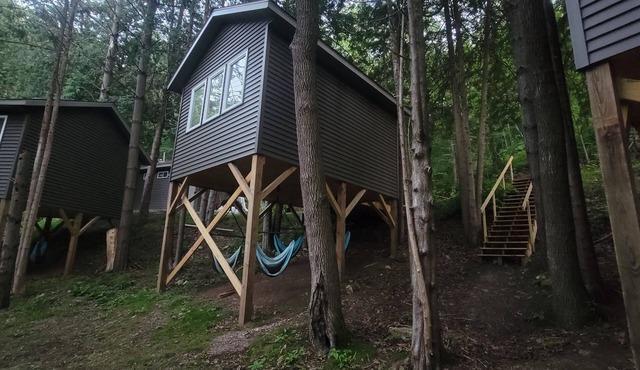 Three Tiny Treehouse Cabins in the Bluff Woodlands in Elba