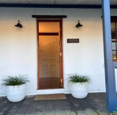Two roomed private suite in front of cottage