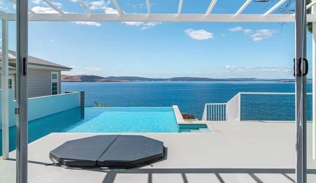 Waterfront Oasis with Infinity Pool and Stunning River Views