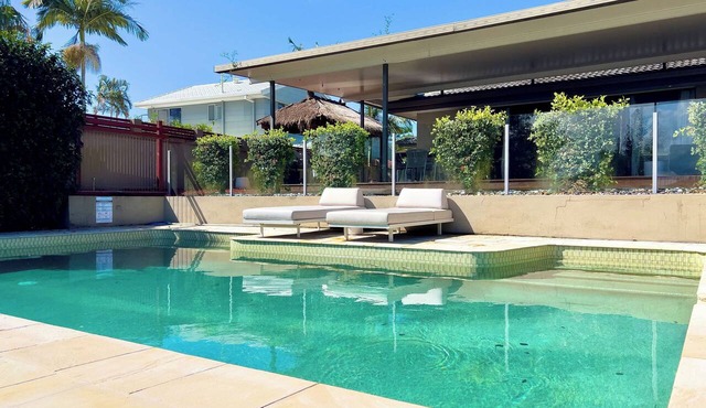 Waterfront Retreat with Pool & Pontoon, Broadbeach in Broadbeach Waters