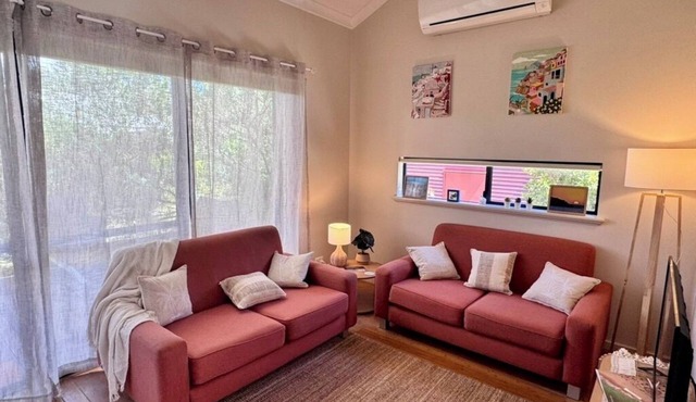 Welcome to Coastal Breeze Beach Villa surrounded by nature.
