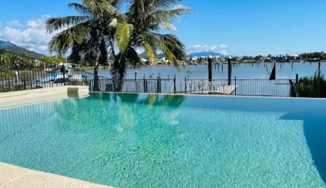 Welcome to 'Hinchinbrook Escape' Waterfront Townhouse with Marina Berth Pool Spa