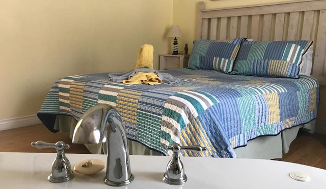 Whispering Waves Cottages in Roseway