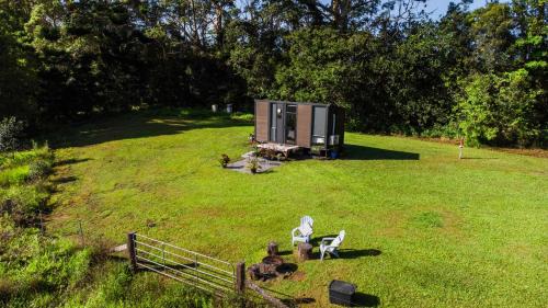 White Jacaranda Tiny House by Tiny Away