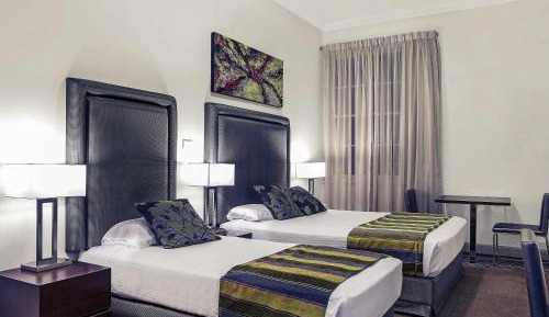 Standard Room with One Queen Bed and One Single Bed
